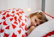 A kid laying in a thick duvet also helps you find best duvets deals on Christmas