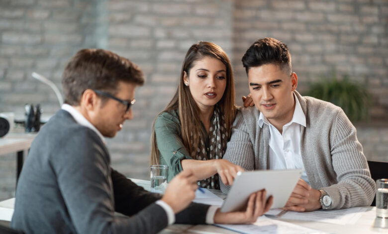 Couple taking assistance from legal advisors